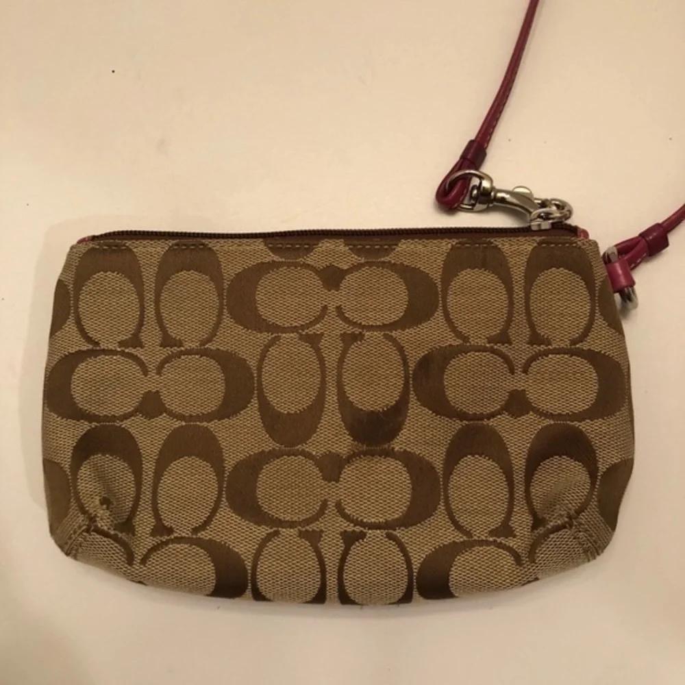 Coach signature brown dark pink leather wristlet